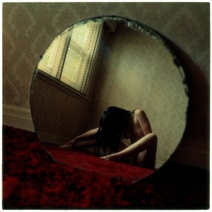 prostitute song Candy's Caravan Burlesque lonely mirror naked woman reflection dim light window blinds