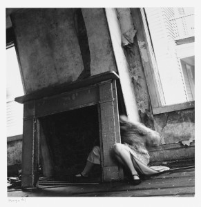 Eating the darkness songwriting inspiration Francesca Woodman peeling wallpaper fireplace empty room abandoned house self-portrait