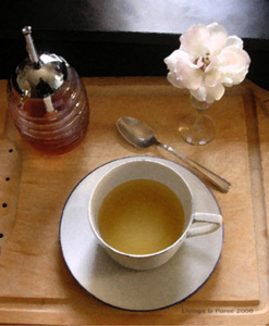 tea cup tea honey in jar white flower